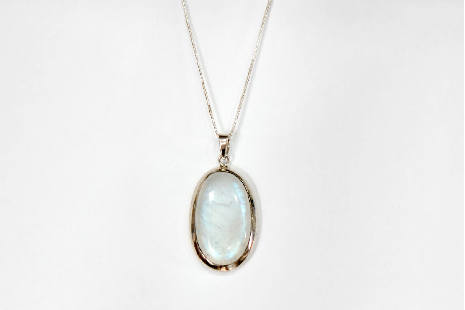 Large Oval Moonstone set on Thick Silver Mount with 20ins.50cm.Curb Chain