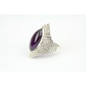 Oval pointed Amethyst set in heavy silver detailing size 9 or R
