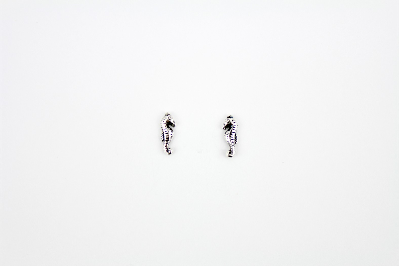 Small Seahorse silver stud earrings